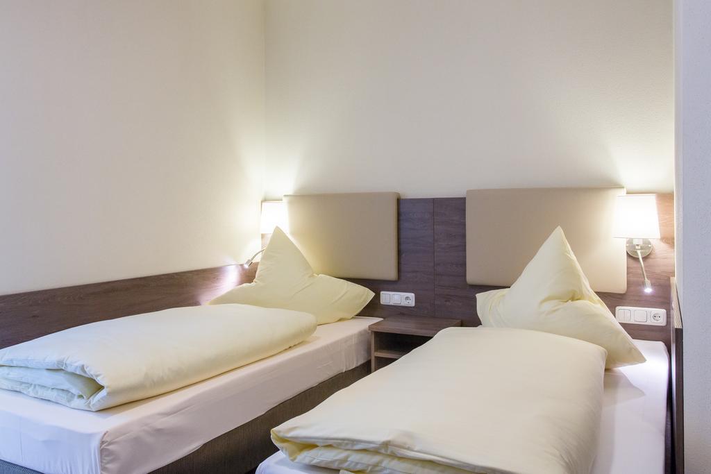Cityapart Hotel Dingolfing Zimmer foto